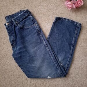 Men's Medium Wash Wrangler Distressed Torn Blue Jeans